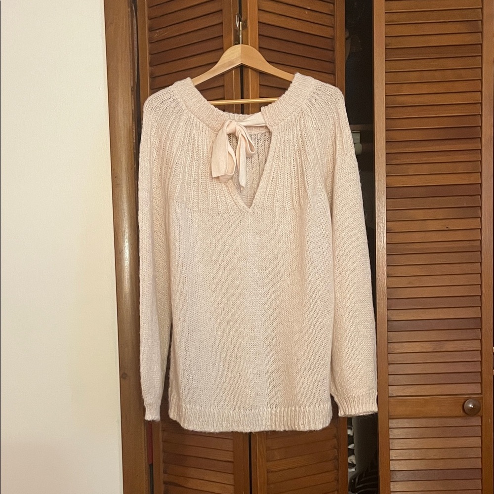 Light pink sweather with tie neck